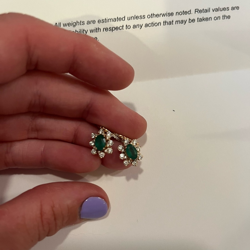 Perry’s emerald and diamond studs. Retail Value $1850